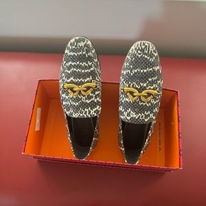 black & white snaked embossed leather & detailed with horse-head  hardware